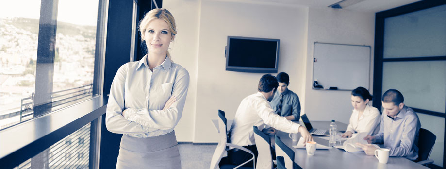 Photo of woman posing in a board room